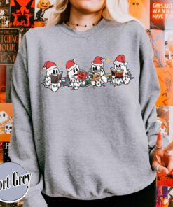 vintage t shirt christmas ghost reading sweatshirt for book lovers featuring cute spooky ghost design ideal for halloween and holiday celebrations tdyrk