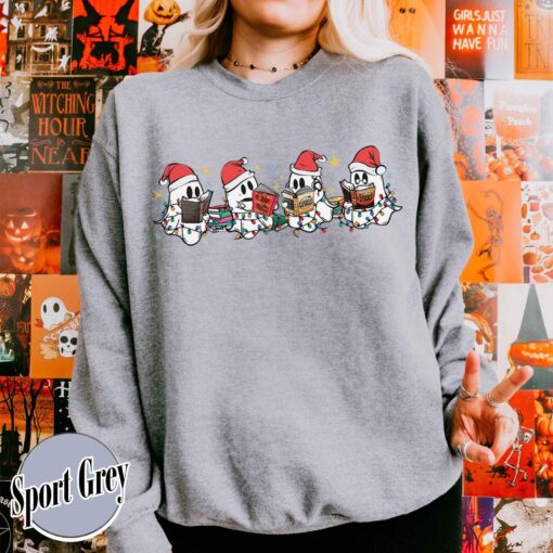 vintage t shirt christmas ghost reading sweatshirt for book lovers featuring cute spooky ghost design ideal for halloween and holiday celebrations tdyrk