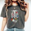vintage t shirt christmas pregnant skeleton tee for pregnancy announcement and baby reveal in comfort colors cotton fabric ikpfy scaled