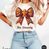 vintage t shirt custom teacher christmas shirt with gingerbread bow design in comfort colors for fun holiday celebrations o4k3t scaled