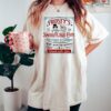 vintage t shirt frostys snowflake cafe shirt for christmas featuring hot cocoa and cookies design in comfort colors s85ho scaled