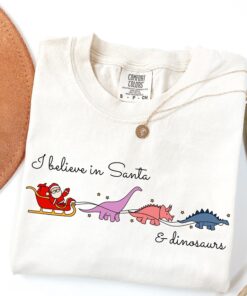 vintage t shirt i believe in santa and dinosaurs funny christmas shirt for dinosaur lovers and teachers o84yu scaled