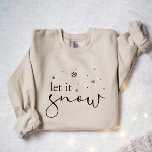 vintage t shirt let it snow design winter sweatshirt for women featuring a fun holiday theme ideal for winter lovers and christmas celebrations mhhkx scaled