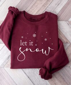 vintage t shirt let it snow design winter sweatshirt for women featuring a fun holiday theme ideal for winter lovers and christmas celebrations pvglj scaled