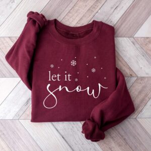 vintage t shirt let it snow design winter sweatshirt for women featuring a fun holiday theme ideal for winter lovers and christmas celebrations pvglj scaled