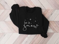 vintage t shirt let it snow design winter sweatshirt for women featuring a fun holiday theme ideal for winter lovers and christmas celebrations rszsc scaled