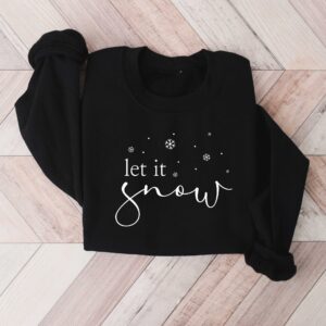 vintage t shirt let it snow design winter sweatshirt for women featuring a fun holiday theme ideal for winter lovers and christmas celebrations rszsc scaled