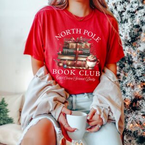 vintage t shirt north pole book club christmas t shirt bookish design for winter reading lovers and holiday enthusiasts d3dzv