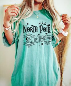 vintage t shirt north pole hot chocolate crewneck for christmas parties featuring santa design and polar express theme uoafw scaled