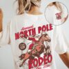 vintage t shirt north pole rodeo tee unisex cowboy santa claus design comfort colors for country christmas celebrations bt1qd