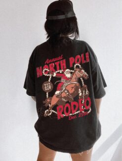vintage t shirt north pole rodeo tee unisex cowboy santa claus design comfort colors for country christmas celebrations dd4ig