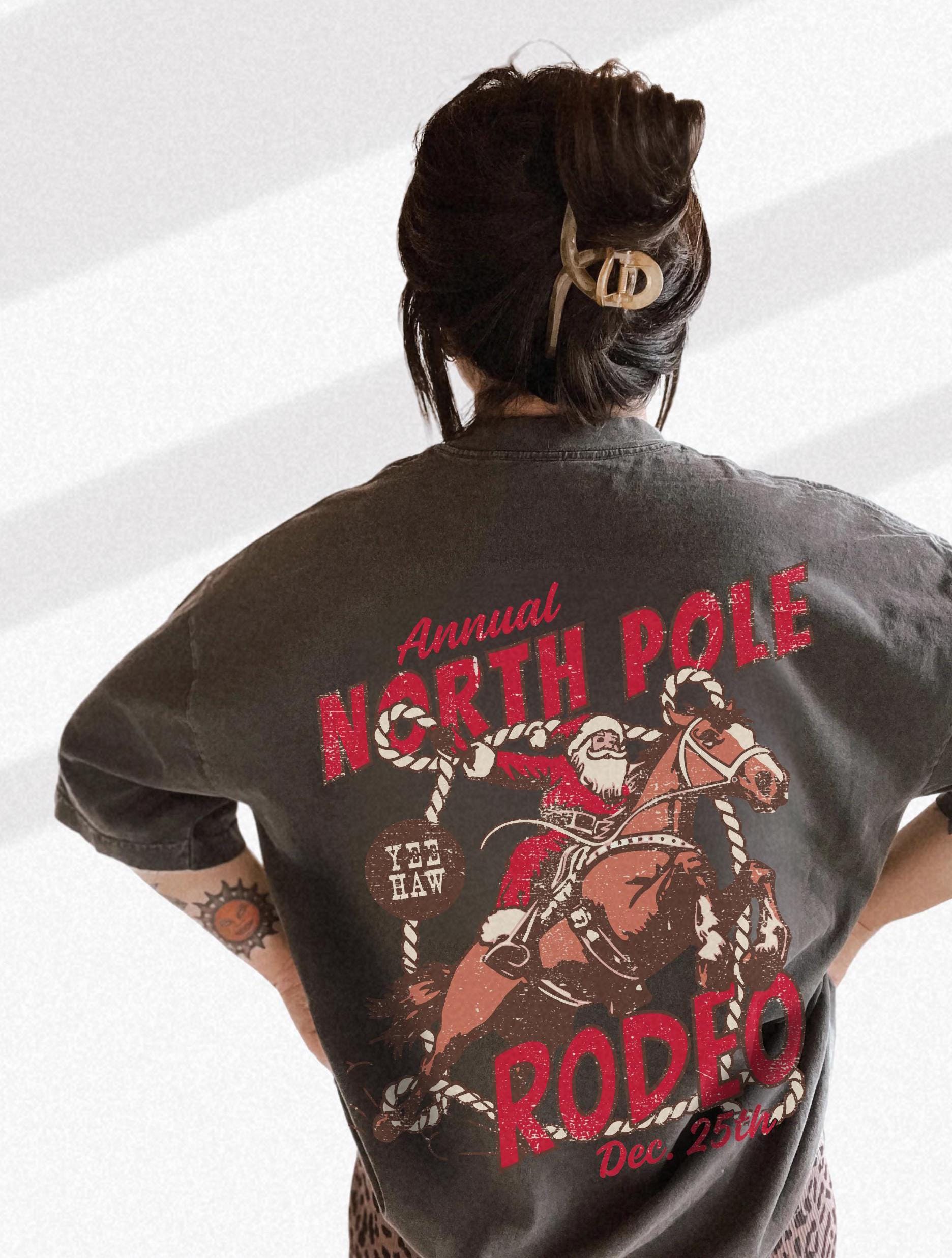 vintage t shirt north pole rodeo tee unisex cowboy santa claus design comfort colors for country christmas celebrations hfiym