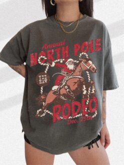 vintage t shirt north pole rodeo tee unisex cowboy santa claus shirt comfort colors western design for country christmas celebrations zdzty