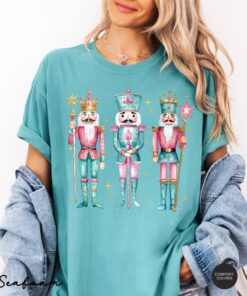 vintage t shirt nutcracker christmas shirt for women in pink funny holiday tee for christmas celebrations and festive occasions idltn scaled