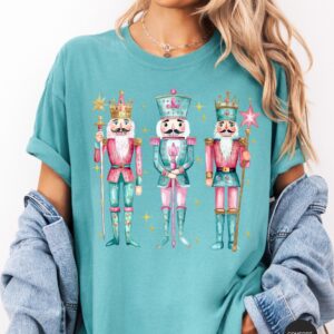 vintage t shirt nutcracker christmas shirt for women in pink funny holiday tee for christmas celebrations and festive occasions idltn scaled