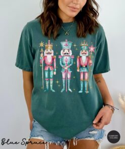 vintage t shirt nutcracker christmas shirt for women in pink funny holiday tee for christmas celebrations and festive occasions owub4 scaled