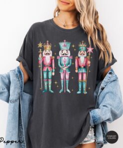 vintage t shirt nutcracker christmas shirt for women in pink funny holiday tee for christmas celebrations and festive occasions vtk0u scaled