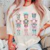 vintage t shirt nutcracker christmas shirt womens holiday tee in pink comfortable colors with fun design for festive celebrations qpgrd scaled