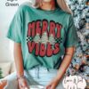 vintage t shirt retro christmas design oversized checkered tee with merry vibes and cute holiday cakes for festive celebrations hxk4g