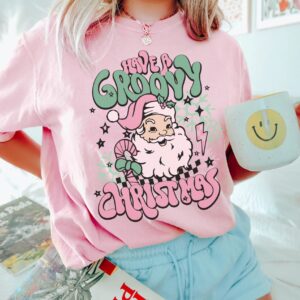 vintage t shirt retro santa graphic tee for women in pink with hippie design for a fun christmas celebration a3kre