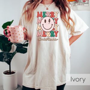 vintage t shirt smiley face merry christmas crewneck shirt retro design with bold xmas lightning for holiday celebrations bd2ng