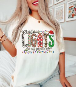 vintage t shirt with christmas lights design featuring animal print and merry bright theme for holiday celebrations 17nxc
