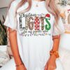 vintage t shirt with christmas lights design featuring animal print and merry bright theme for holiday celebrations kfirf