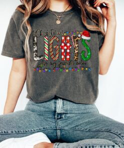 vintage t shirt with christmas lights design featuring animal print and merry bright theme for holiday celebrations qrgwh