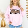 checkered retro mama sweatshirt for moms varsity crewneck funny mom shirt ideal for mothers day gifts and mom life oozmx