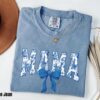 comfort colors mama shirt in blue ribbon cute mom shirt for mothers day girly aesthetic bow design chinoiserie style 7wthn scaled