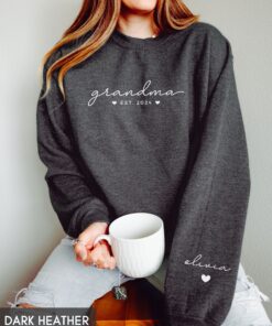 custom grandma sweatshirt with grandchildren names on sleeve personalized mothers day gift new grandma announcement heart print sfodh