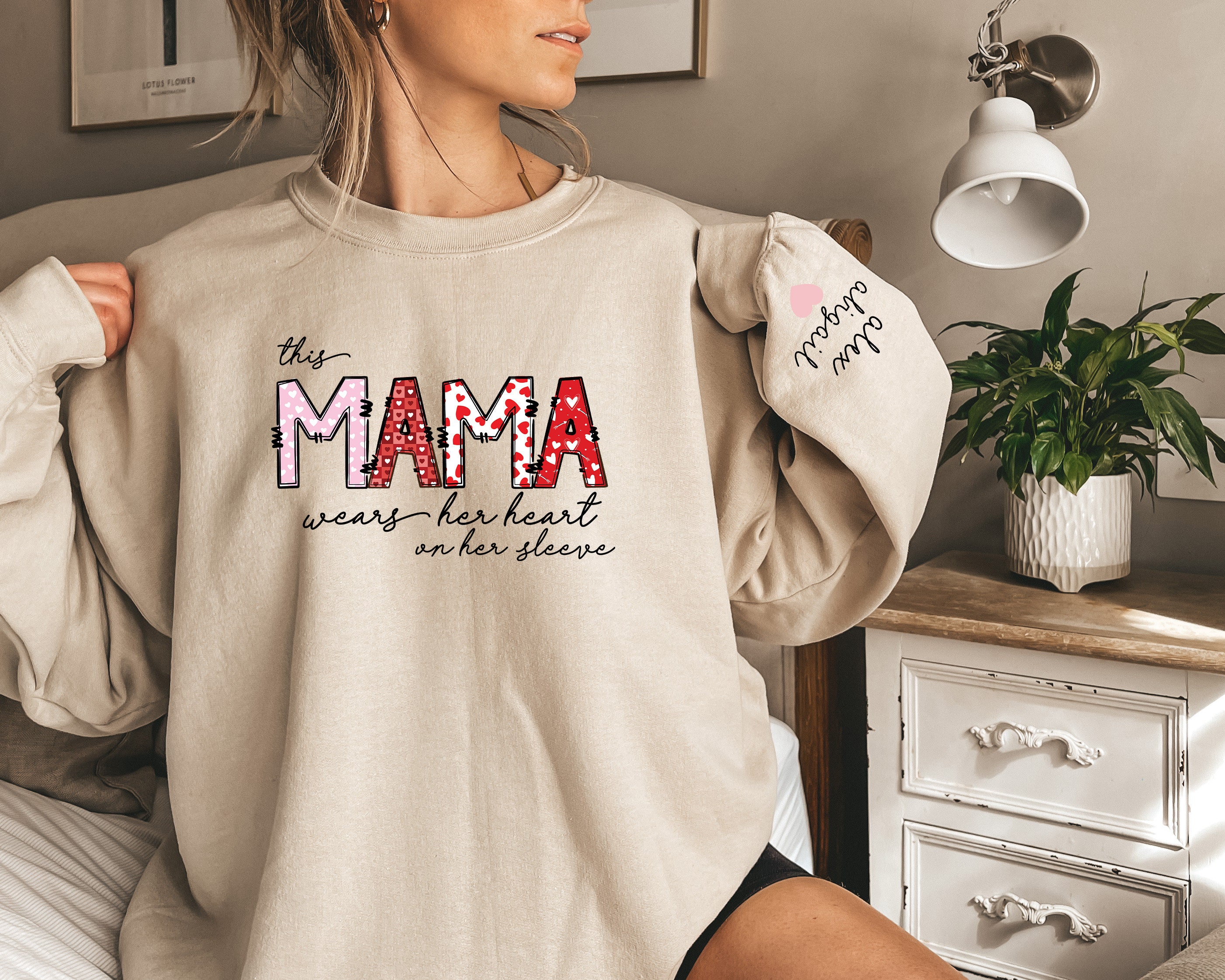 custom mama sweatshirt this mama wears her heart on her sleeve funny mom shirt for mothers day personalized mom gifts xwhye scaled