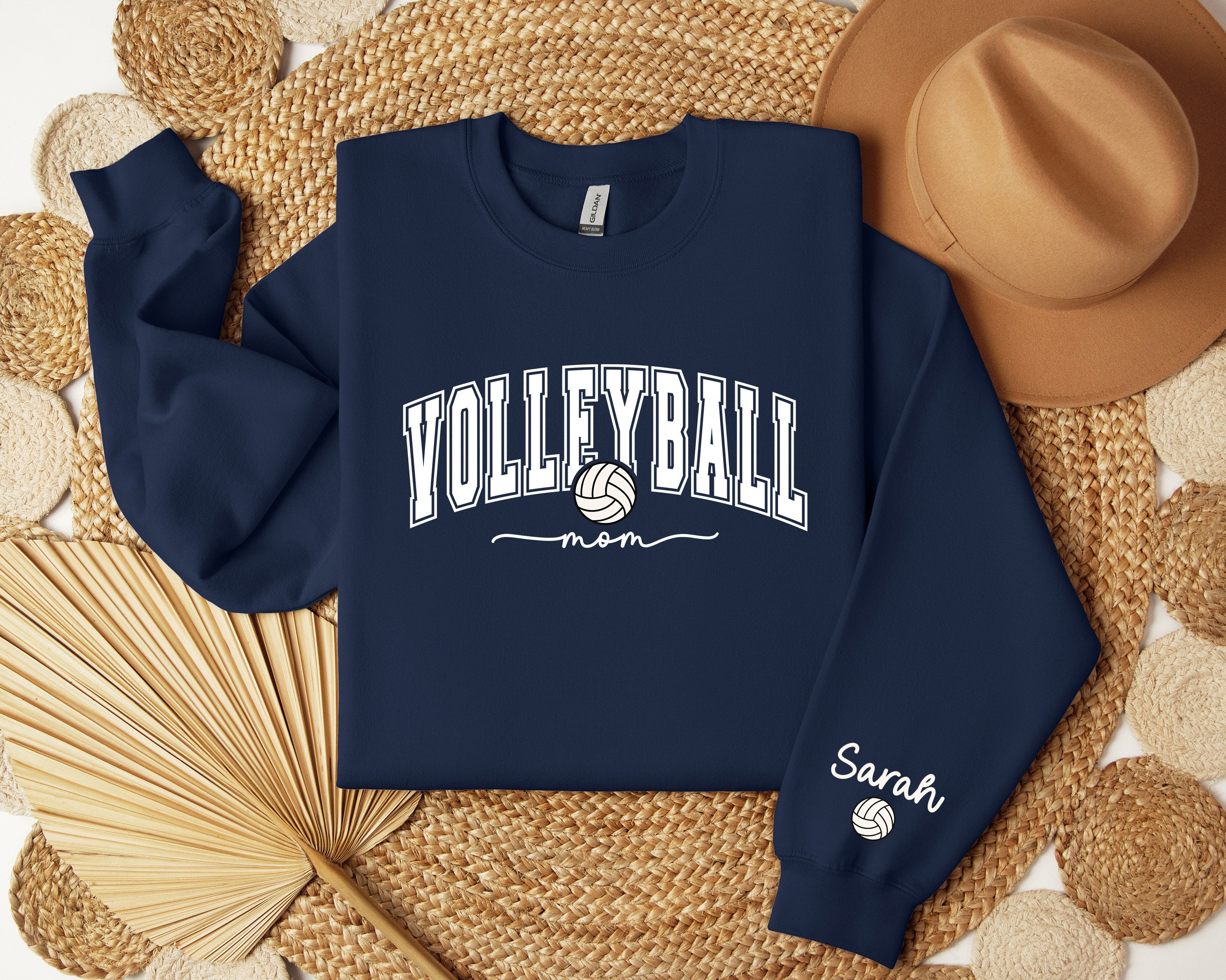 custom volleyball mom sweatshirt with kids name on sleeve for sporty moms game day hoodie gwfbs scaled