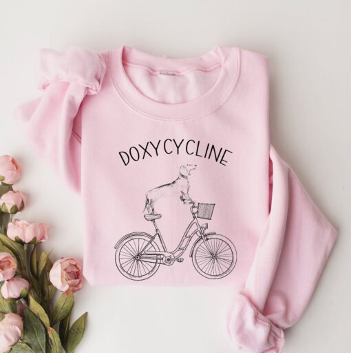 doxycycline pharmacy pun sweatshirt with dachshund on bicycle for pharmacist and veterinarian gifts 7l085