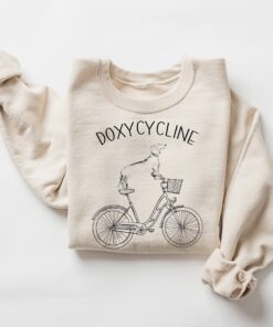 doxycycline pharmacy pun sweatshirt with dachshund on bicycle for pharmacist and veterinarian gifts lm6xp