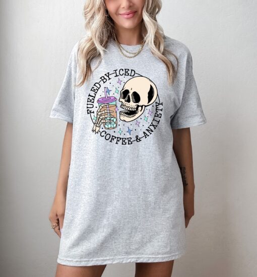 fueled by iced coffee and anxiety shirt for moms funny skull sweatshirt mental health awareness apparel for coffee lovers k4vxl scaled