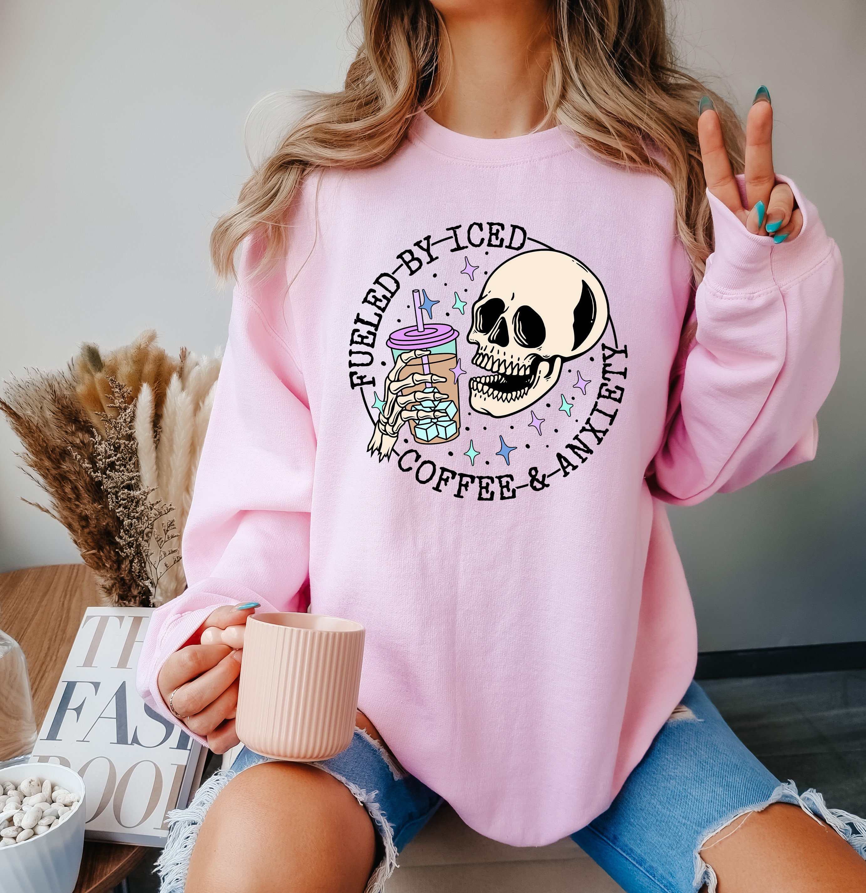 fueled by iced coffee and anxiety shirt for moms funny skull sweatshirt mental health awareness apparel for coffee lovers rq0nc scaled