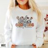 funny pregnancy announcement sweatshirt for new moms growing a human with groovy floral design and baby reveal hoodie sldcp