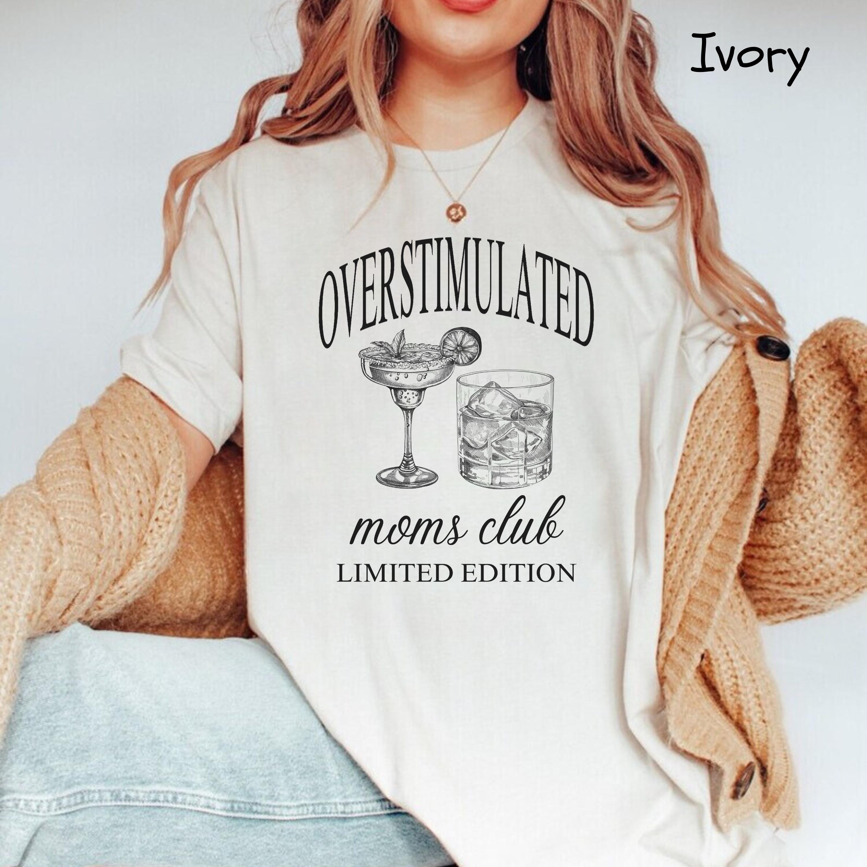 funny tired mom shirt overstimulated unhinged trendy design for moms with unique sense of humor jwctd scaled