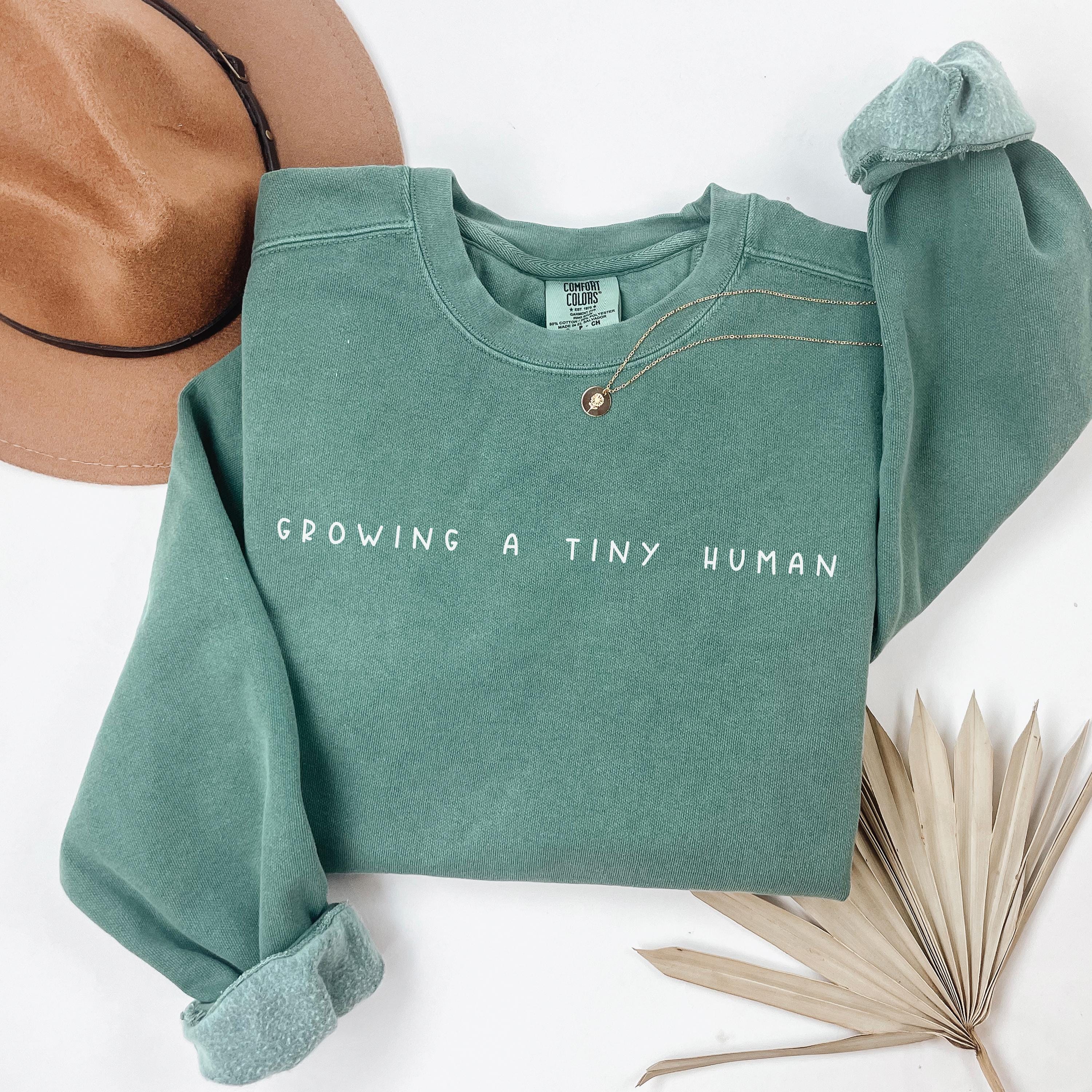 growing a tiny human pregnancy announcement sweatshirt maternity shirt baby reveal gift for expecting moms u5ehn scaled