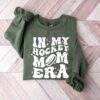 hockey mom era sweatshirt retro ice hockey crewneck funny mama shirt for game day team gifts and goalie moms 6xme5 scaled