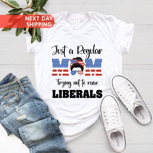 just a regular mom trying not to raise liberals shirt with american flag design for mom life and funny mom shirts lmrqu
