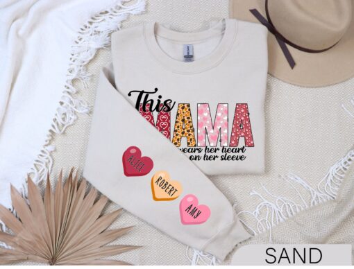 mama wears her heart on her sleeve sweatshirt custom mother shirt for mothers day funny mom life apparel irgt1