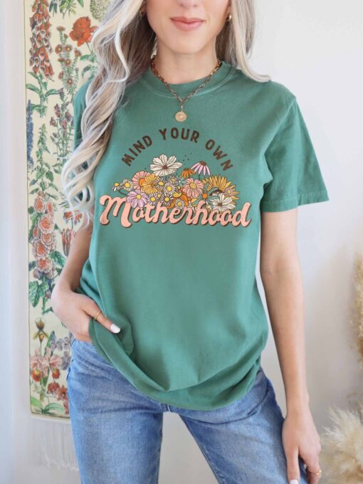 mind your own business motherhood shirt cute rainbow mom t shirt trendy boho style for moms comfort colors tcf6x scaled