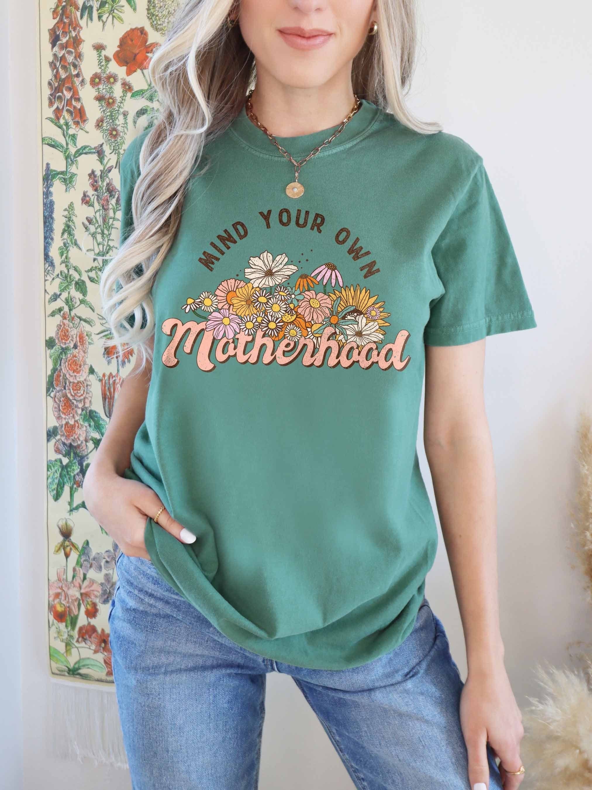 mind your own business motherhood shirt cute rainbow mom t shirt trendy boho style for moms comfort colors tcf6x scaled