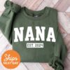 nana est 2024 sweatshirt for new grandmas pregnancy announcement grandma crewneck cute nana shirt unqcu