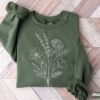 personalized birth month flower sweatshirt for mom and grandma sentimental mothers day gift for plant lovers vtimx scaled