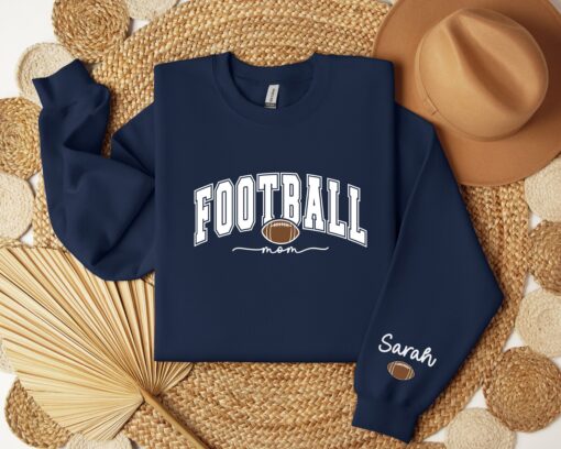 personalized football mom sweatshirt with kids name on sleeve for game day sports moms hoodie qkcyv scaled