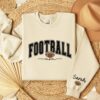 personalized football mom sweatshirt with kids name on sleeve for game day sports moms hoodie t0ara scaled