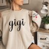 personalized gigi sweatshirt with grandchildren names cute nana hoodie for mothers day gifts unique grandma clothing 4bhuf scaled